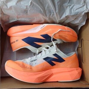 New Balance Women's Sneakers in Orange and Navy
